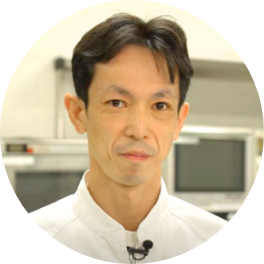 開発担当 / 商品本部長 齊藤克敬